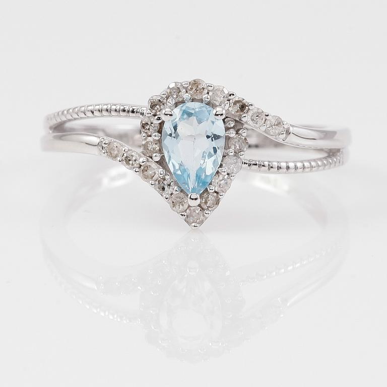 RING, 14K vitguld, diamanter tot ca 0.17 ct. och akvamarin tot ca 0.50 ct.