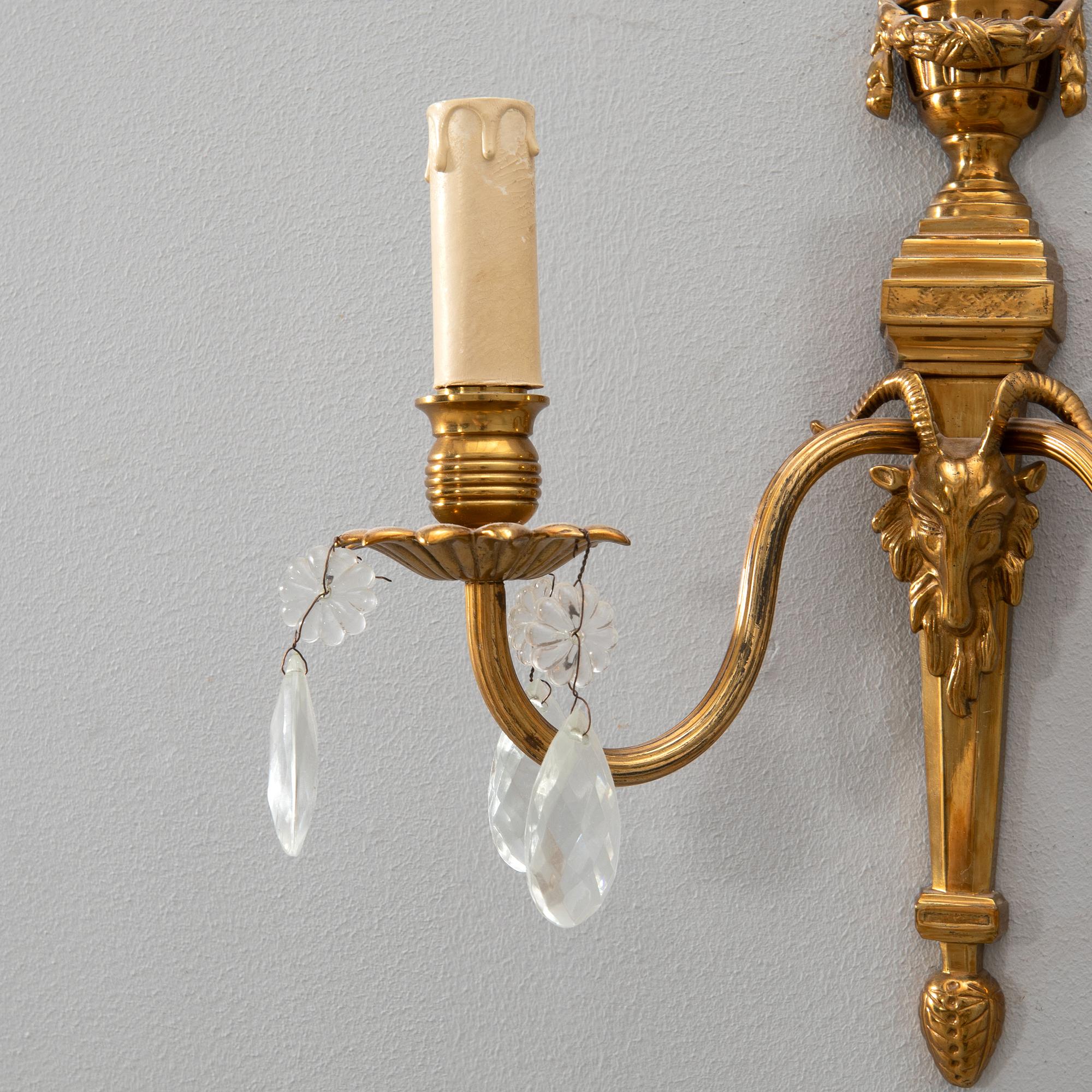 Pair of Louis XVI-style sconces, first half of the 20th century.