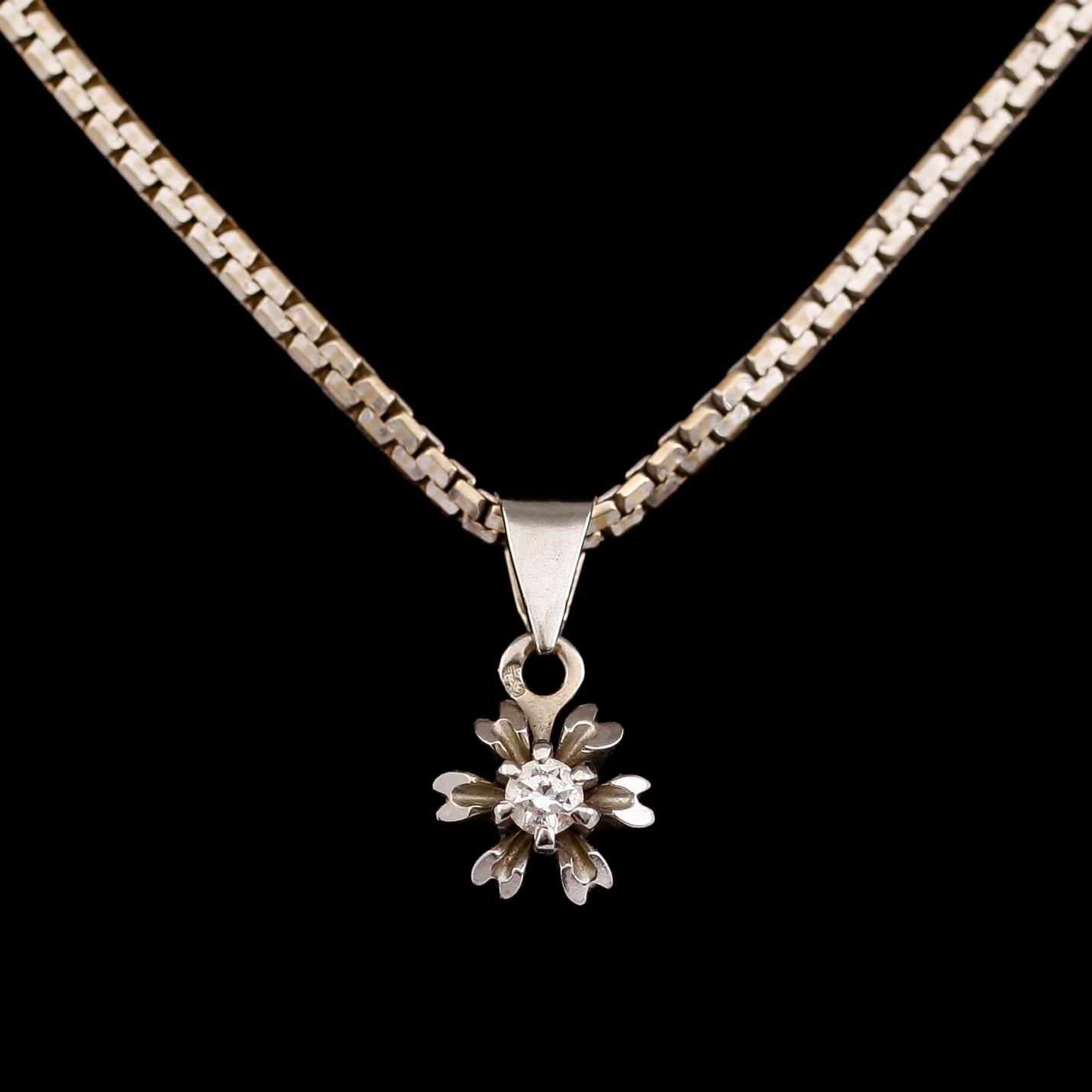 HÄNGE MED KEDJA, 18 k vitguld, briljantslipad diamant. Total vikt 11 g.