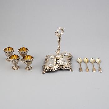 An English silver-gilt egg cruet set, mark of James Charles Edington, London 1857.