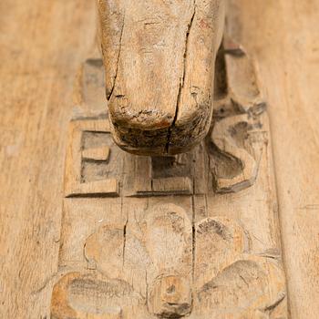 A Swedish folk art mangle board with carved decorationd, owners' initials and the date 1744.