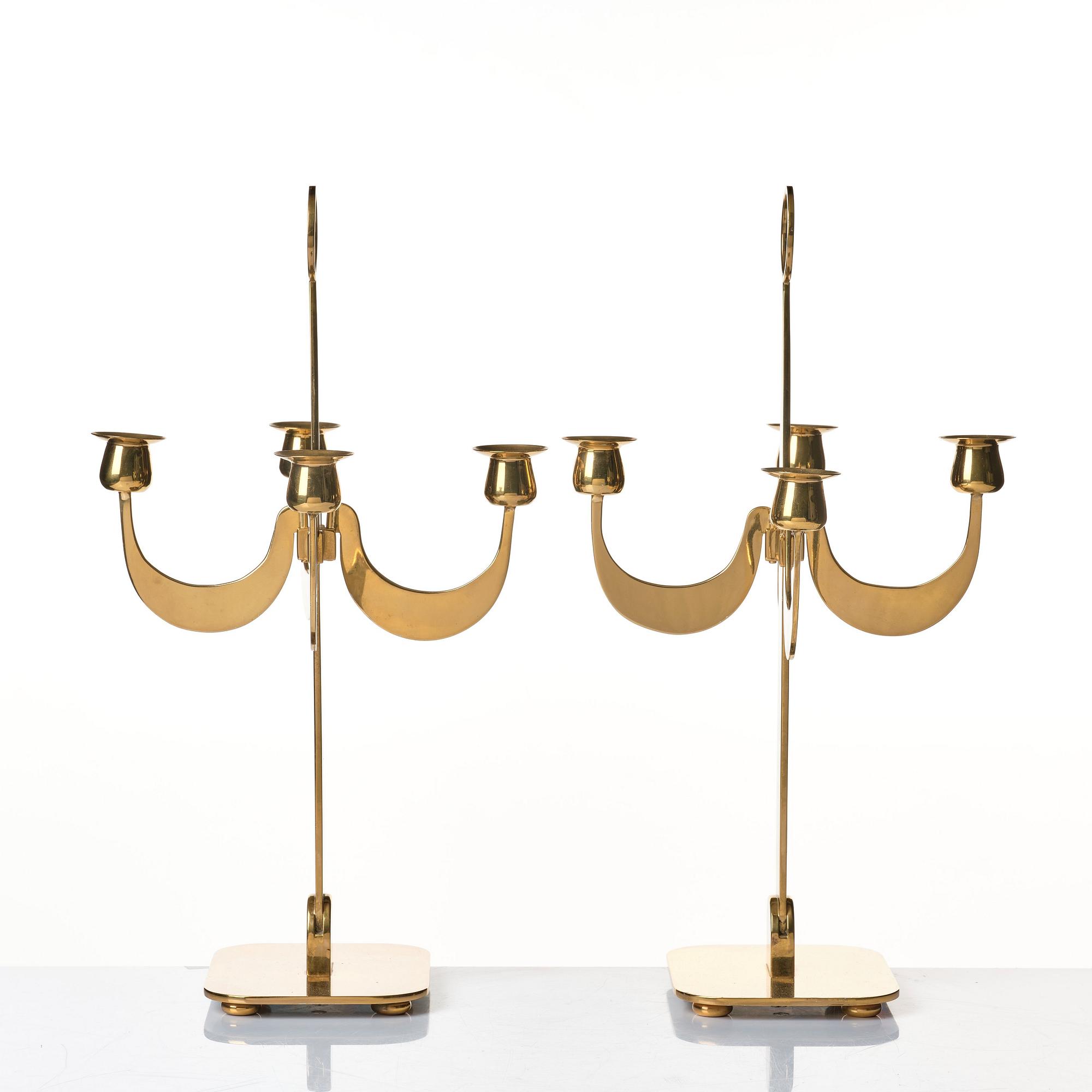 Josef Frank, a pair of brass candelabra by Svenskt Tenn, Sweden 1950's, model nr 2663.
