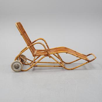 A rattan lounge chair.