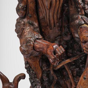A large well sculptured root sculpture of 'Sholau and attendant', late Qing dynasty, 19th century.