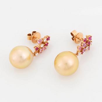 A pair of 18K rose gold cultured South Sea pearl earrings.