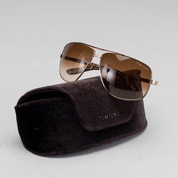 Two pair of Tom Ford Sunglasses.