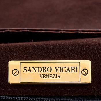 SANDRO VICARI, a brown snakeskin shoulder bag.