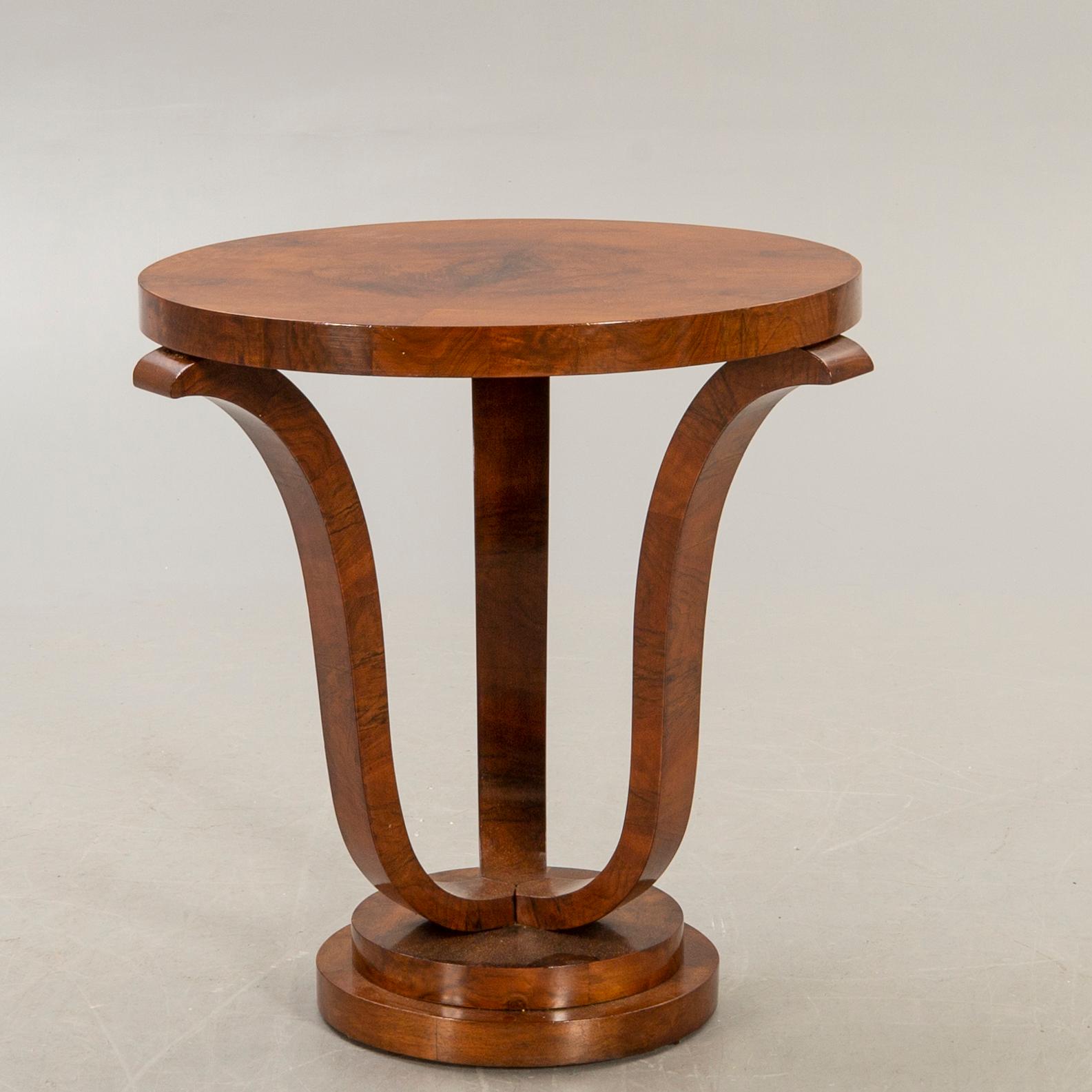 A walnut Art Deco style side table alter part of the 20t  century.
