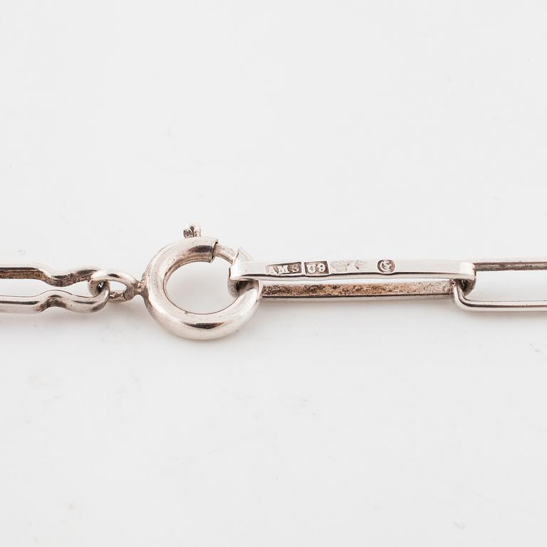 GERT THYSELL, Gussi, Malmö, 1967, a faceted smoky quartz pendant.