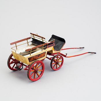 A painted metal horse carriage Germany c 1890-1900.