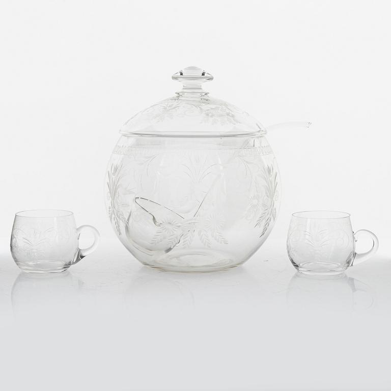 A punch bowl and mugs, glass, mid 20th century.
