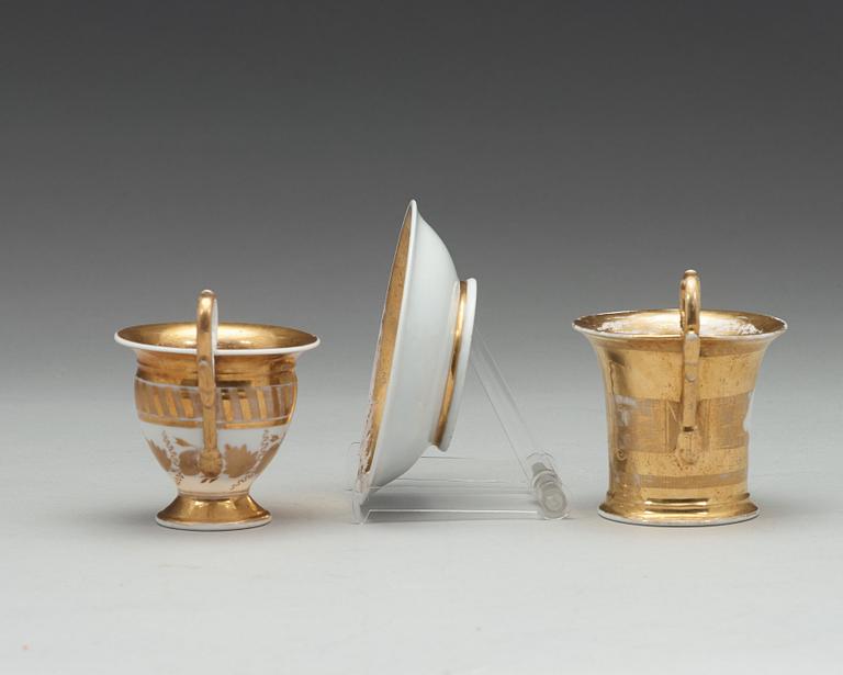 Empire, A Russian cup with saucer, Kudinovs Brothers factory (Завод братьев Кудиновых) and a single cup, Empire.