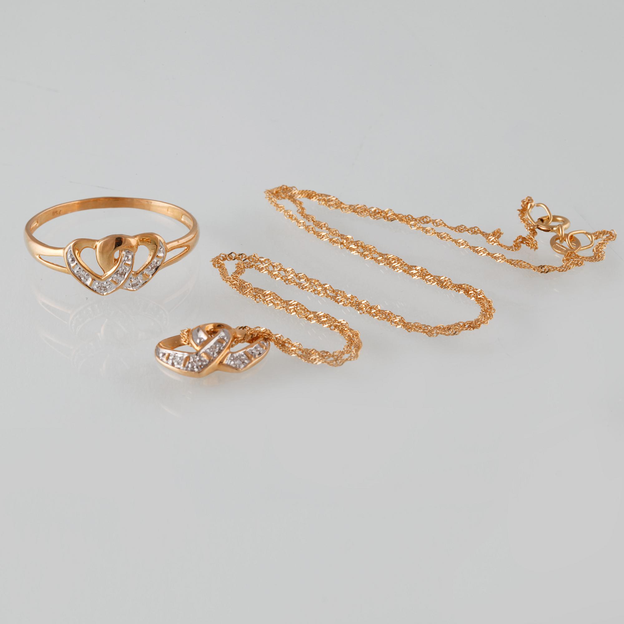 HÄNGE SAMT RING, 18K guld med 10 åttkantslipade diamanter. Vikt 3,5 gram.
