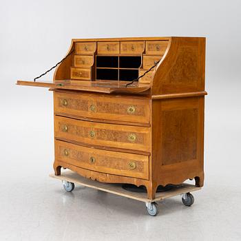 A slant-front chest of drawers, late Baroque style, 19th century.