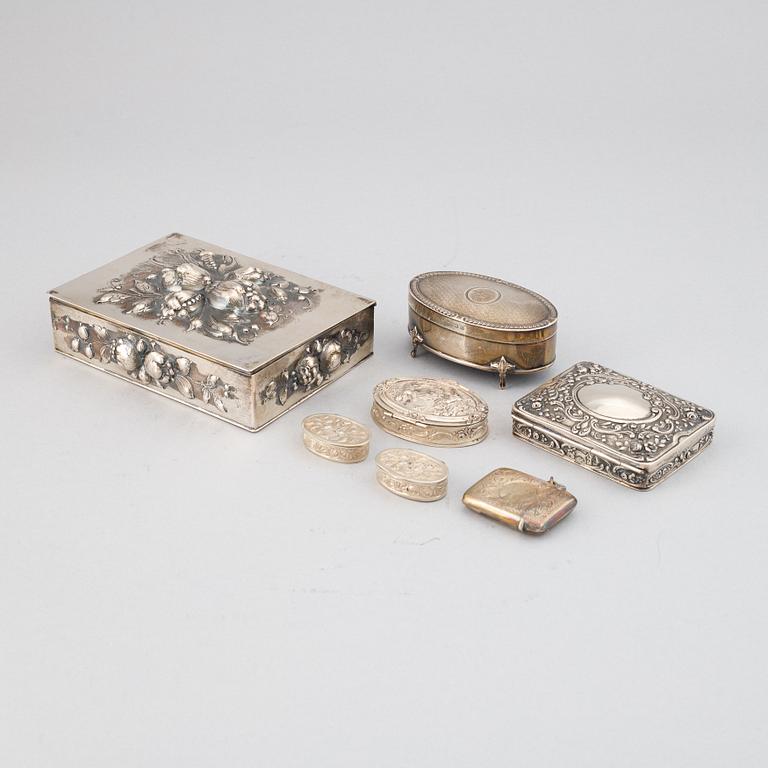 7 silver boxes.