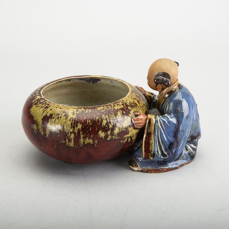 A Japanese 20th century signed porcelain figurine.