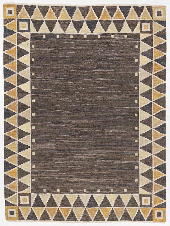 A flat weave rug, c. 245 x 185 cm.