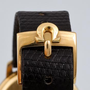 ARMBANDSUR, herr, 18 k guld, "Genève", Omega, total vikt 32 g.