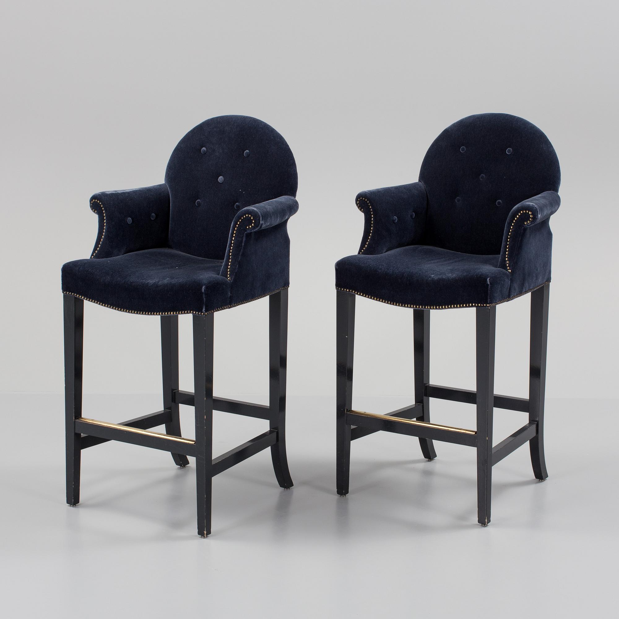 A pair of "The Simplified Moonback Counter Height Stool" barstools by Soane Britain.