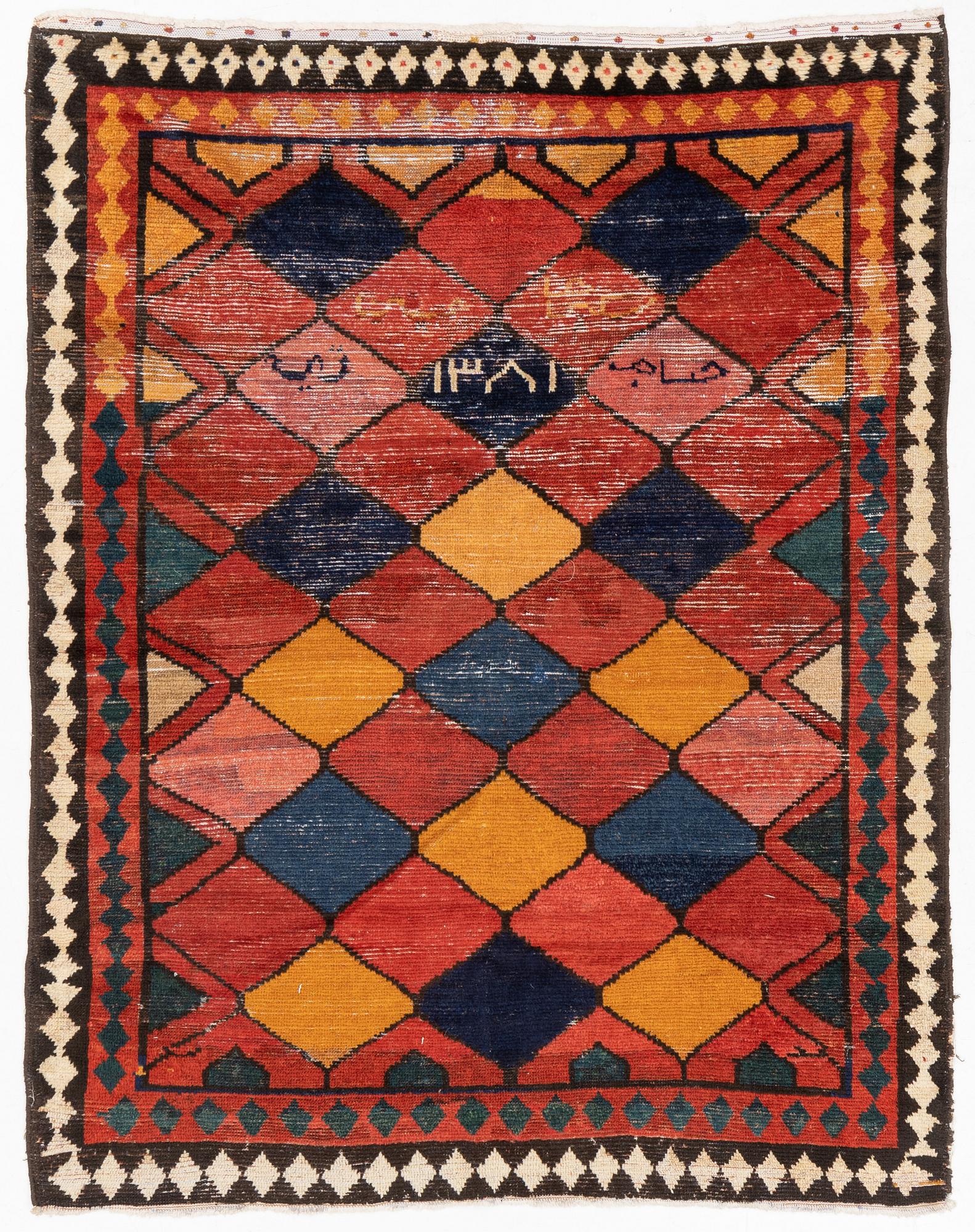 A semi antique Khersake-Bakhtiarirug, c. 211 x 162 cm.