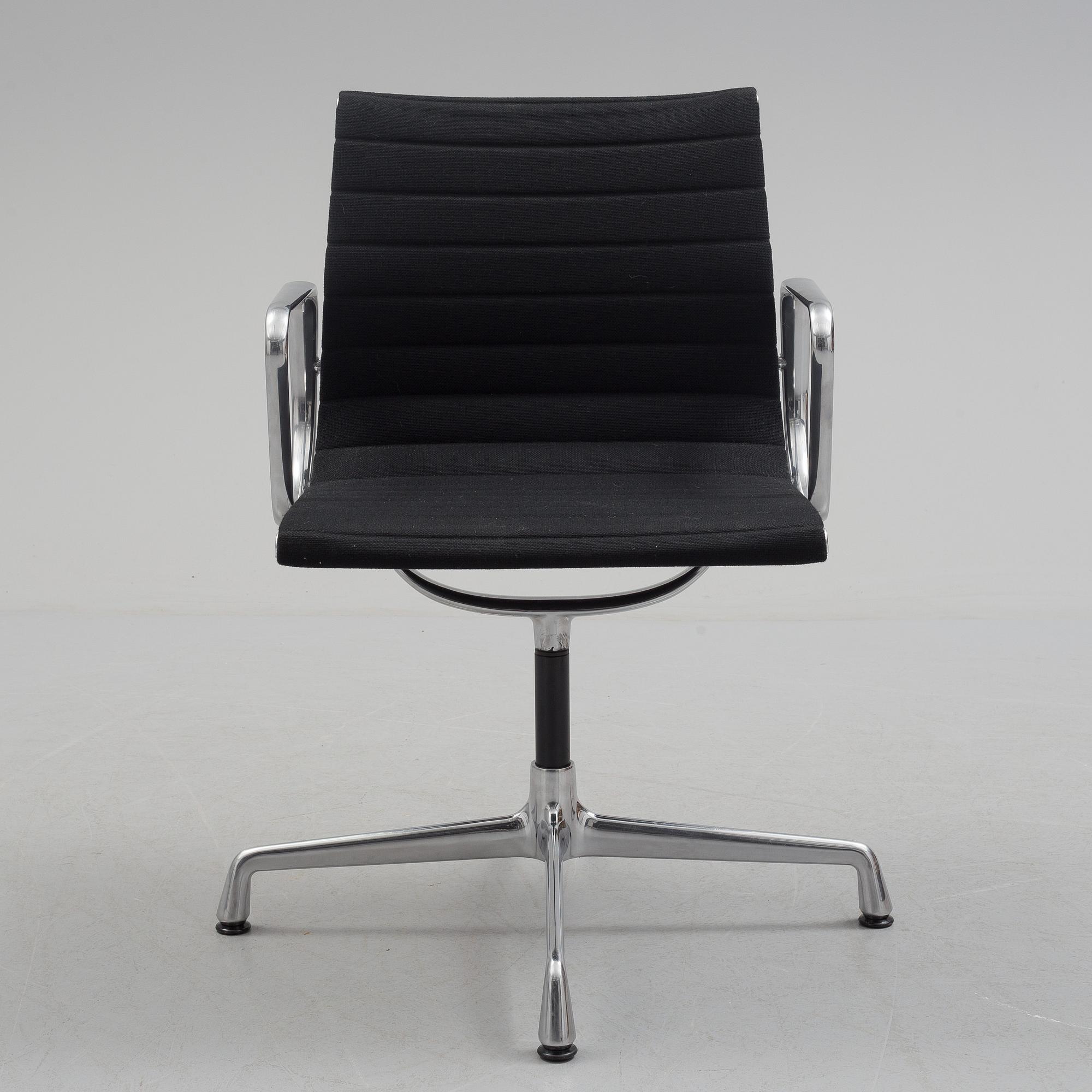 A 'EA 104 Swivel' armchair by Charles & Ray Eames, Vitra, 2016.