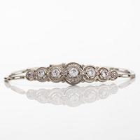 Rannekoru, 14K valkokultaa sekä vanha- ja ruusuhiottuja timantteja, Hugo Grun.