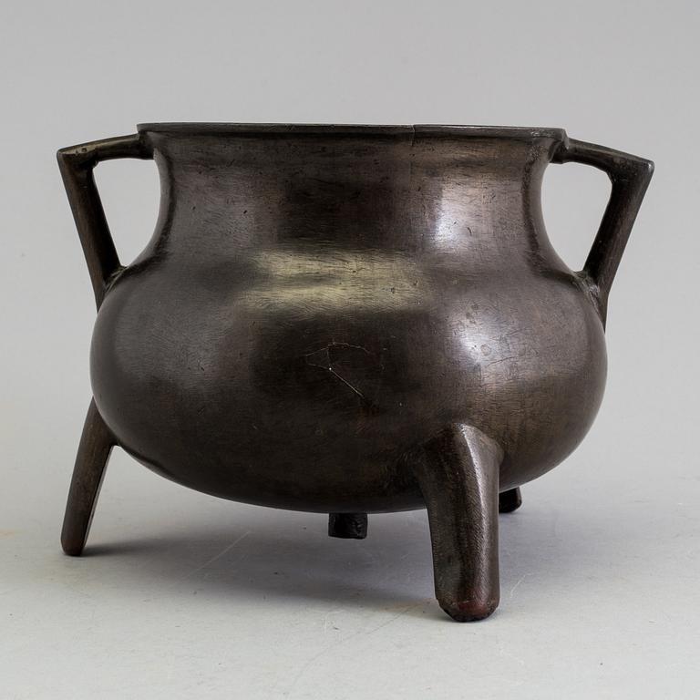 A medieval bronze pot.