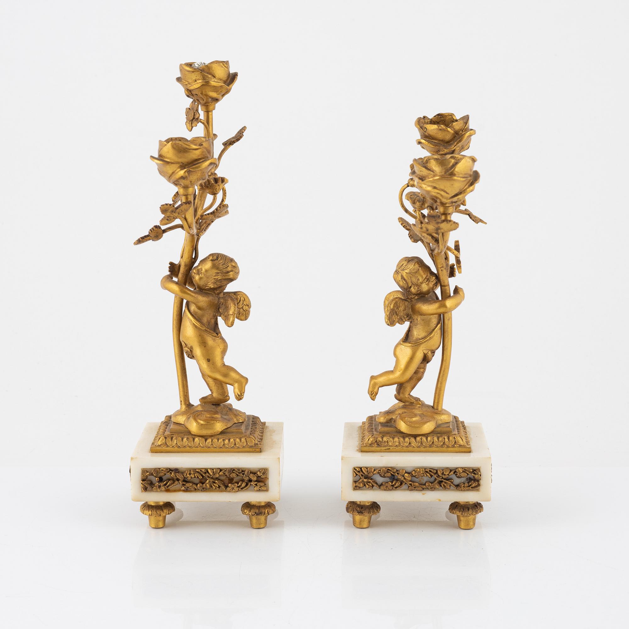 A pair of Louis XVI style candelabras, 20th century.