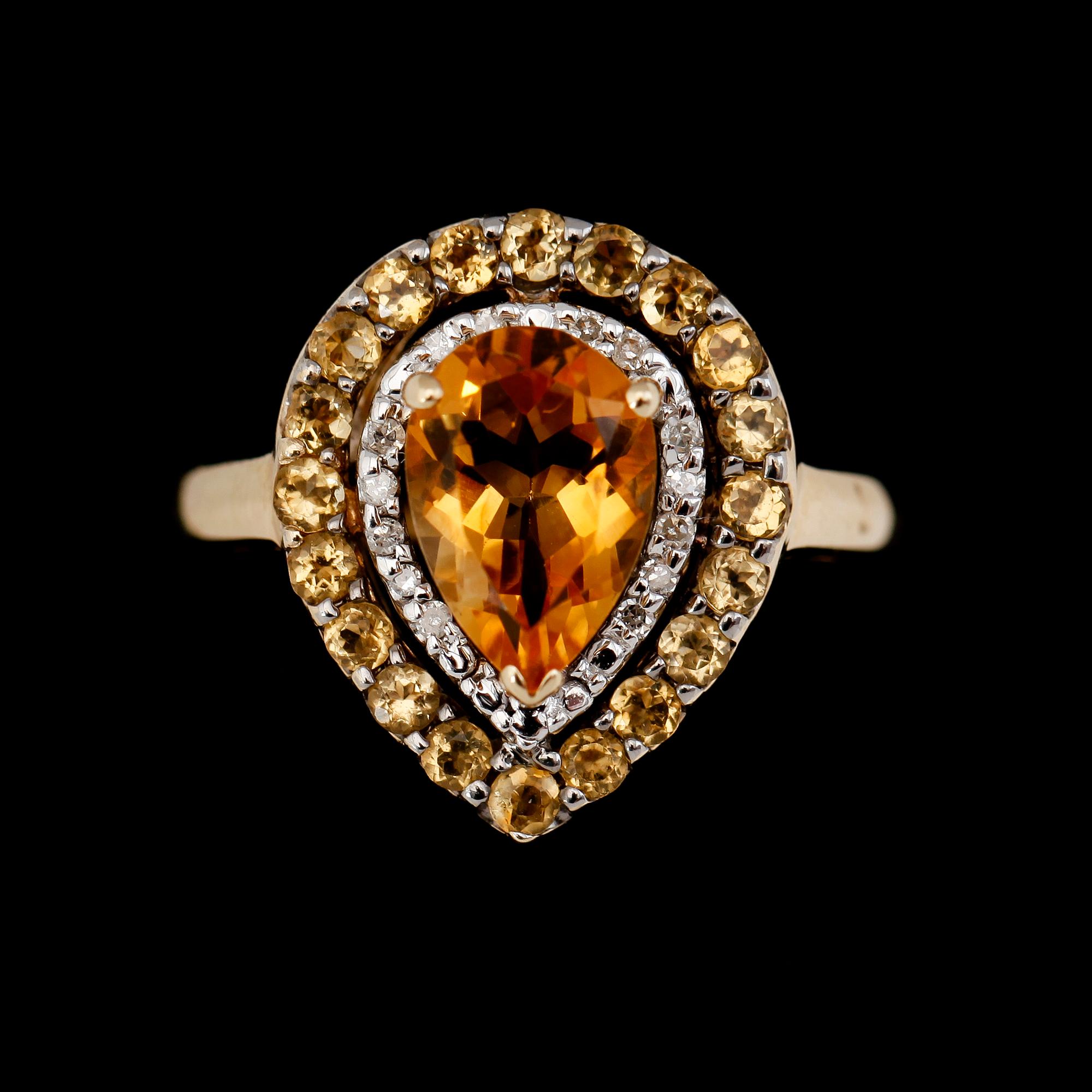 RING, 10K guld, diamanter tot ca 0.07 ct och citriner. Total vikt ca 4 g.