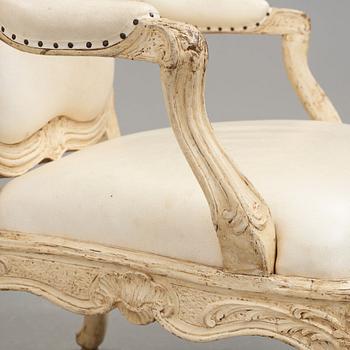 A pair of Swedish Rococo 18th century armchairs attributed to Carl Magnus Sandberg (master in Stockholm 1759-1789).