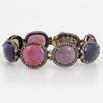 Bracelet with multicoloured stones, including ruby and diamond, silver and gold.