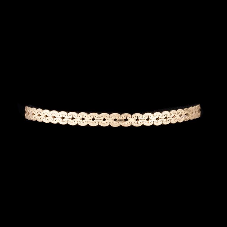 ARMKED, 14K guld. Kellomiehet 1976. Vikt ca 11,0 g.