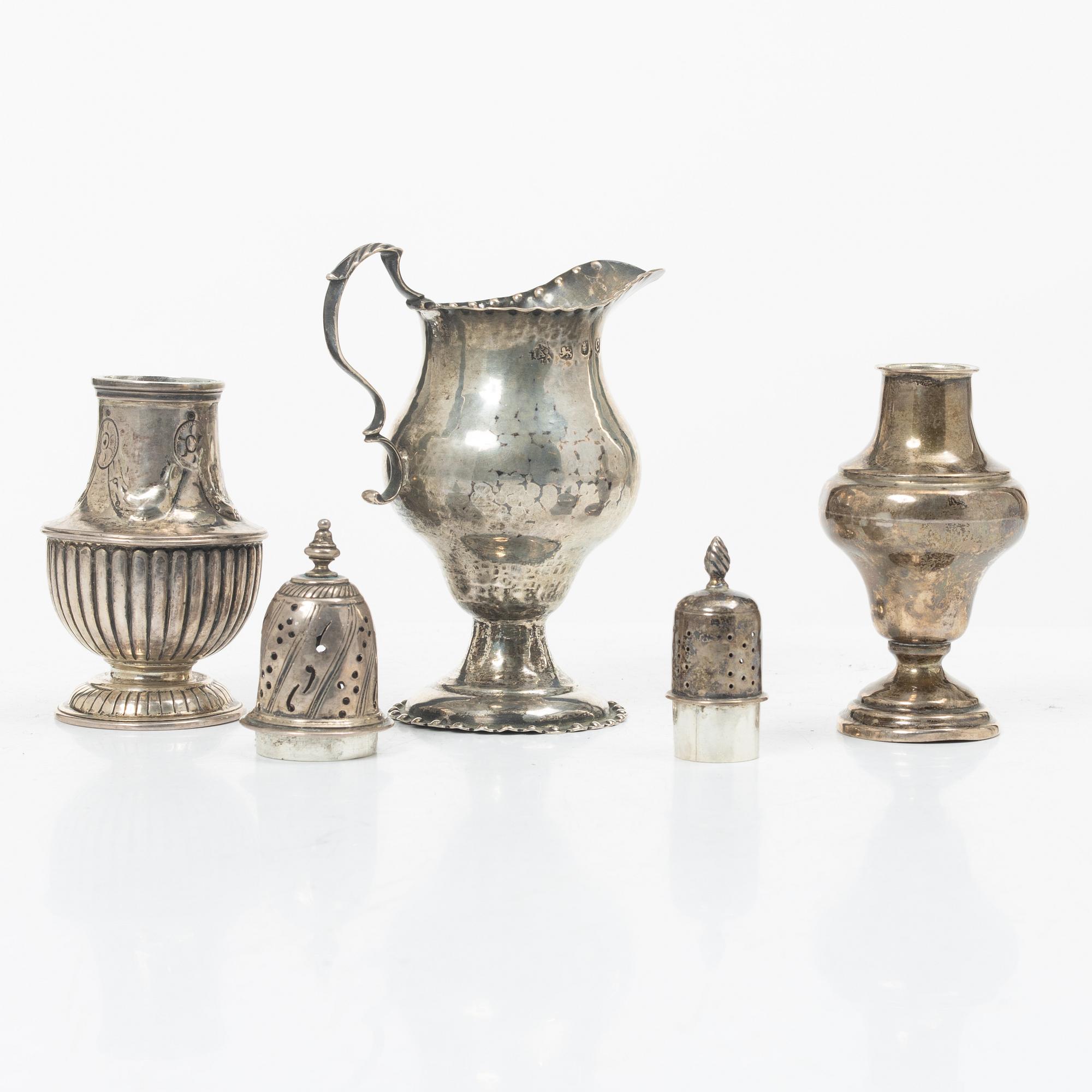 Two silver casters and cream jug, England.