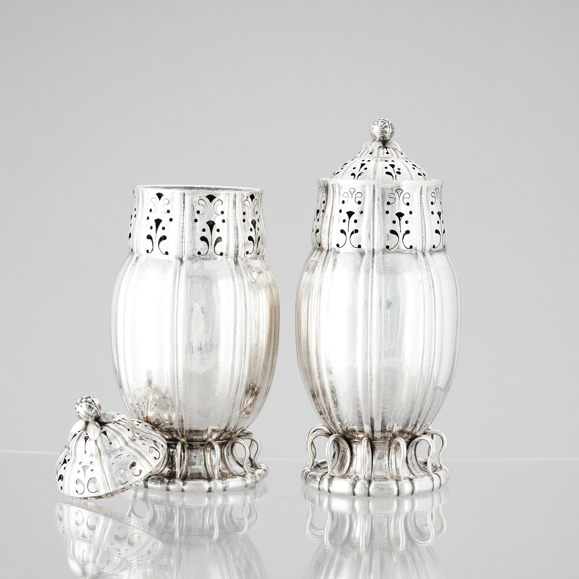 Georg Jensen, a pair of sugar casters, Copenhagen ca 1915-1919, 830/1000 silver, design nr 4.