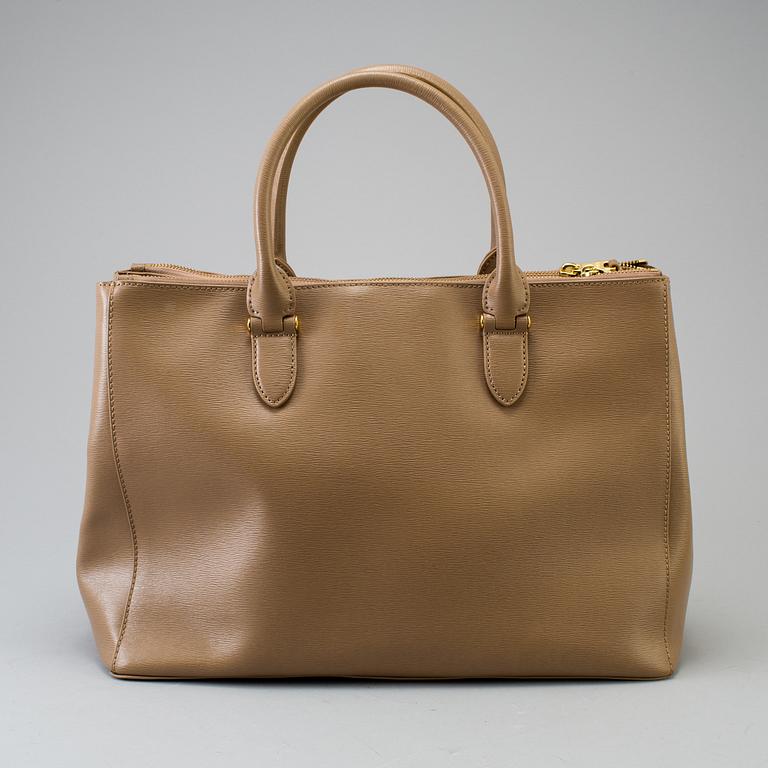 a "Newbury Double-Zip Satchel" bag by Ralph Lauren.