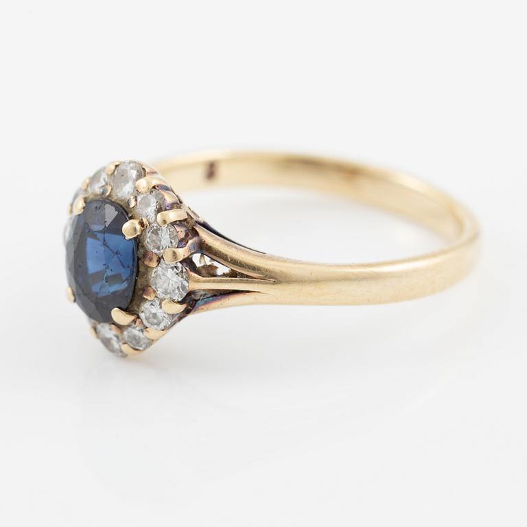 Ring, carved, 14K gold with sapphire and brilliant-cut diamonds.