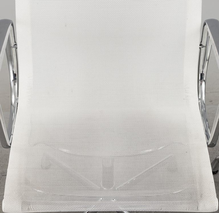 A pair of 'EA 108' desk chairs by Charles & Ray Eames for Vitra.