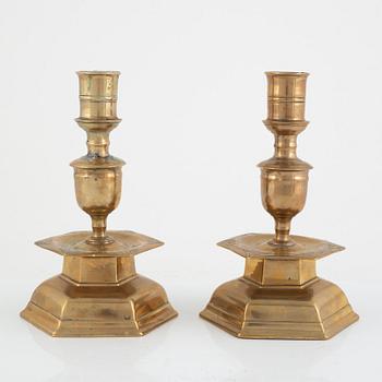 A pair of North-European Baroque brass candlesticks, circa 1700.