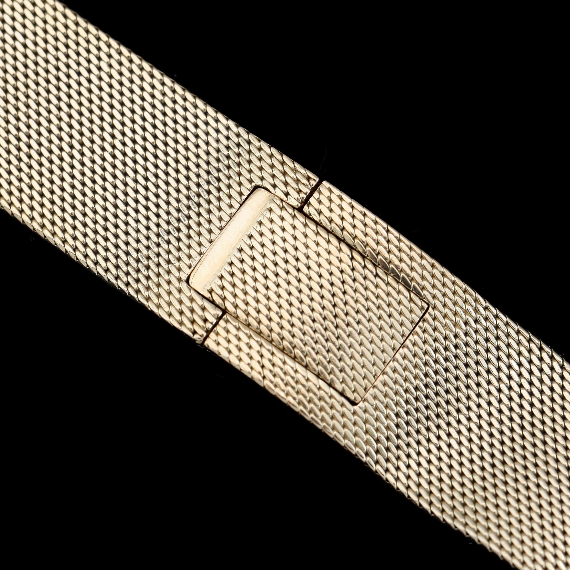 ARMBAND FÖR ARMBANDSUR, 18K guld. Total vikt ca 48 g.