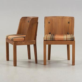 A pair of 'Lovö' stained pine armchairs, Nordiska Kompaniet, Sweden 1930's.