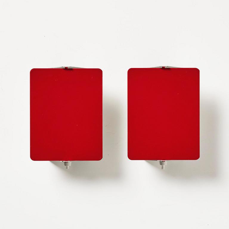 Charlotte Perriand, a pair of wall lights model "CP1", La Société Centrale d'Eclairage, France, 1960s.