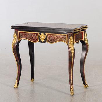A late 20th century card table in Boulle-style.