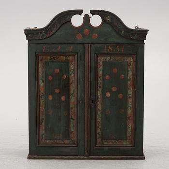 A wall-hanged cabinet, Sweden, dated 1851.