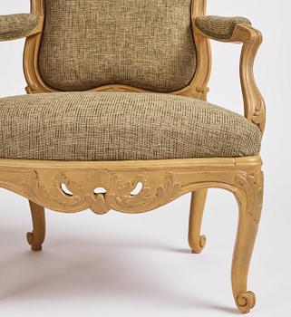 A pair of Swedish Rococo fauteuils à la reine, Stockholm, later part of the 18th century..