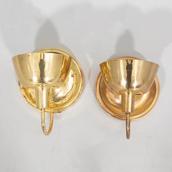 Josef Frank, wall lamps, a pair, brass, model 2389, Firma Svenskt Tenn.