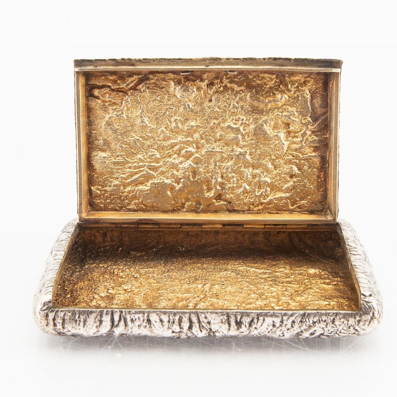 A Russian silver box with samorodok decoration and guilded inside, around 1900.