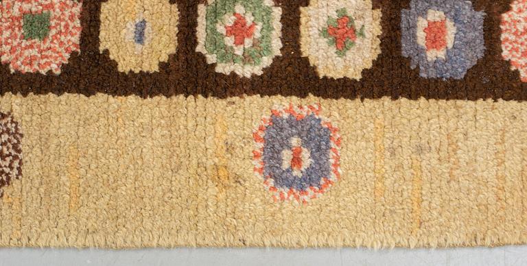 Märta Måås-Fjetterström, a carpet, "Tusenskönan" ("Bellis"), knotted pile, ca 206,5-208,5 x 111-115 cm, signed AB MMF.