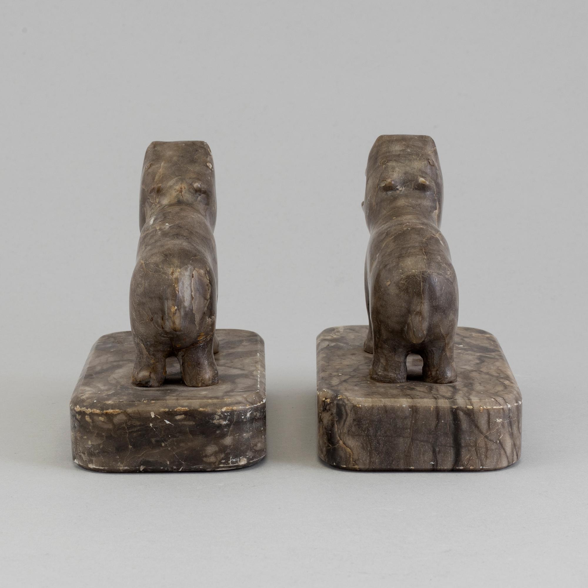 A pair of stone book ends, early 20th century.