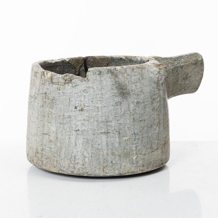 A Swedish carved soapstone jug, 19th century.