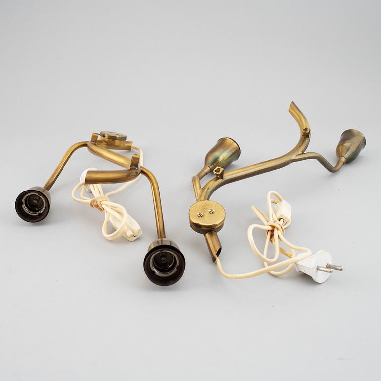 A pair of Astra brass wall lamps, mid 20th century.